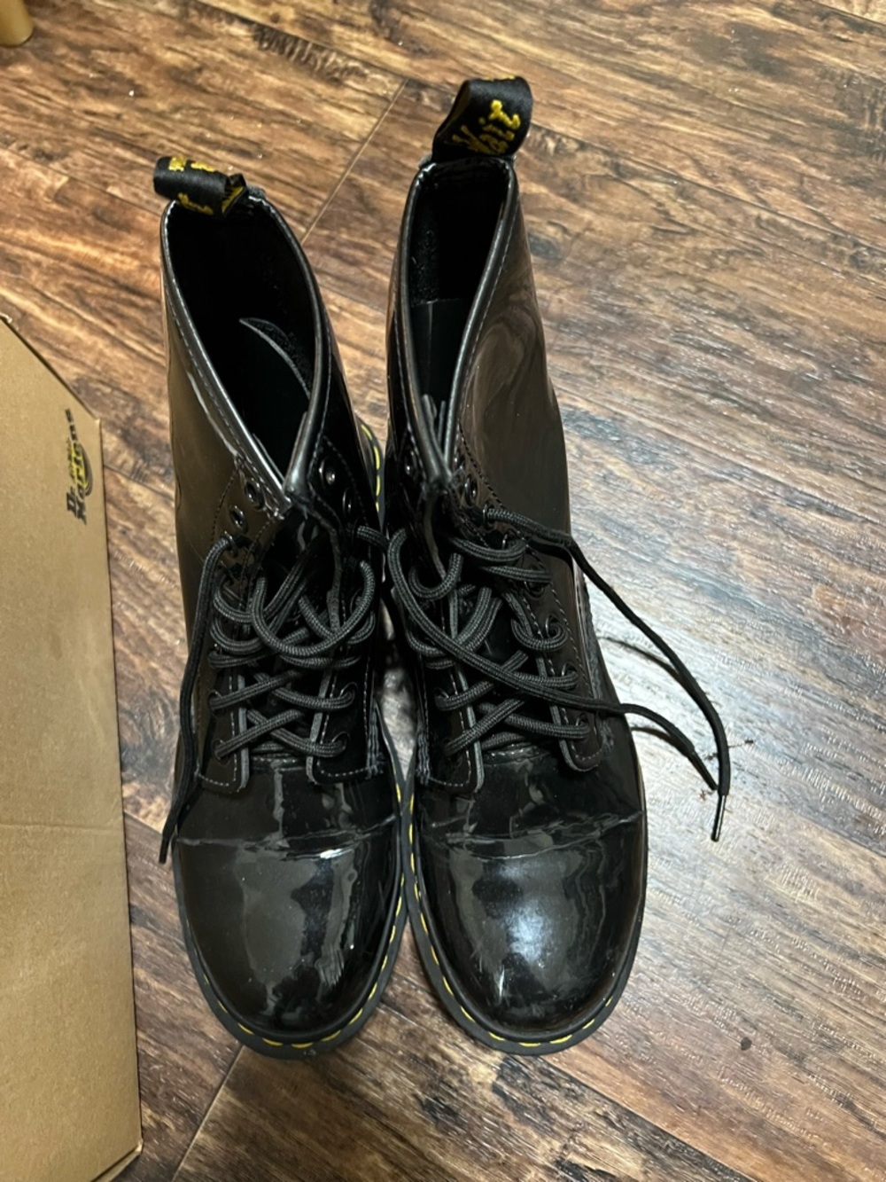 Dr. Martens Women’s Black Patent Lace-Up Combat Boots with Yellow Welt Stitching